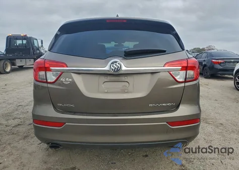 2018 Buick Envision Essence z USA, uszkodzony, nr VIN LRBFX1SA7JD007716